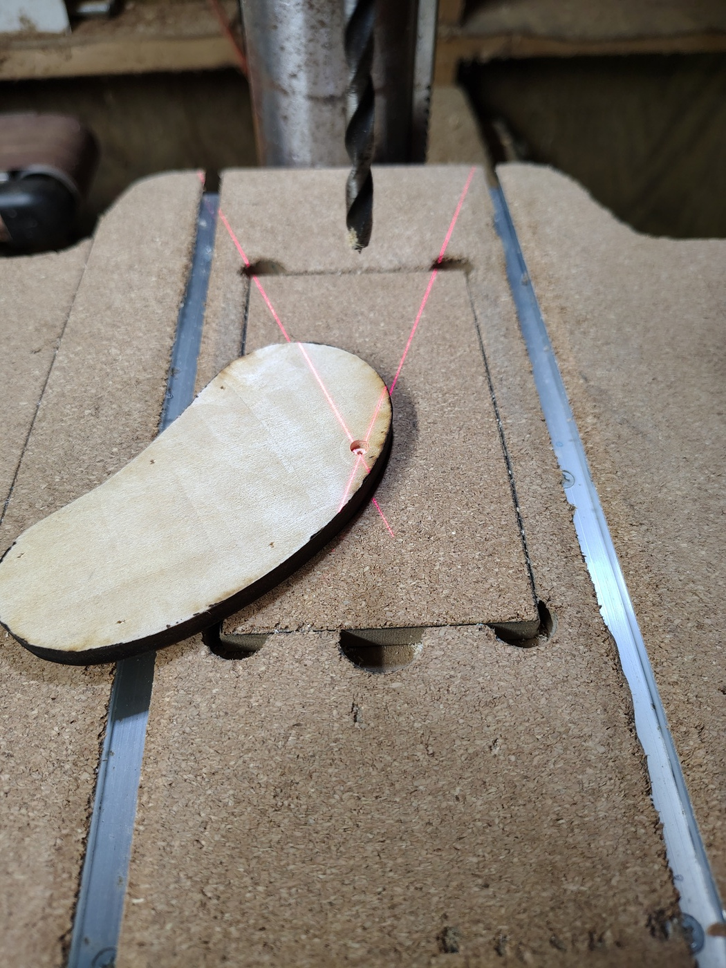 Drilling magnet recesses in
                the cover plate