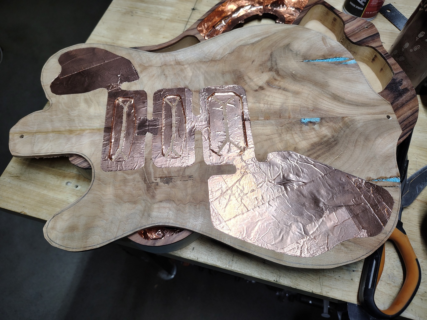 Underside of the drop top with
                copper shielding