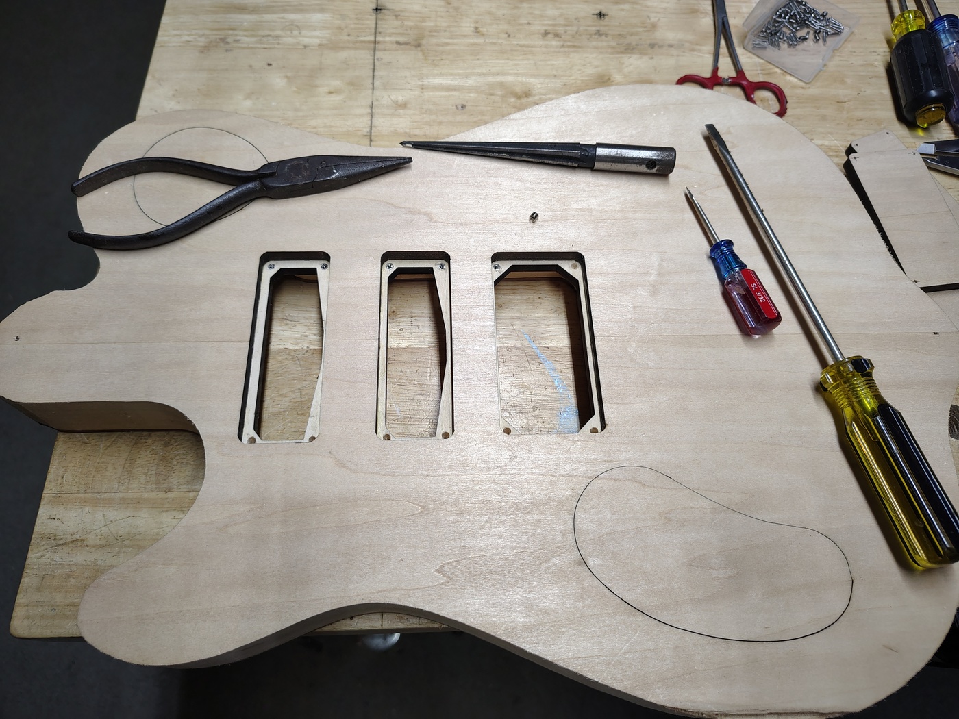 Installing the pickup
                  mounting ring threaded inserts