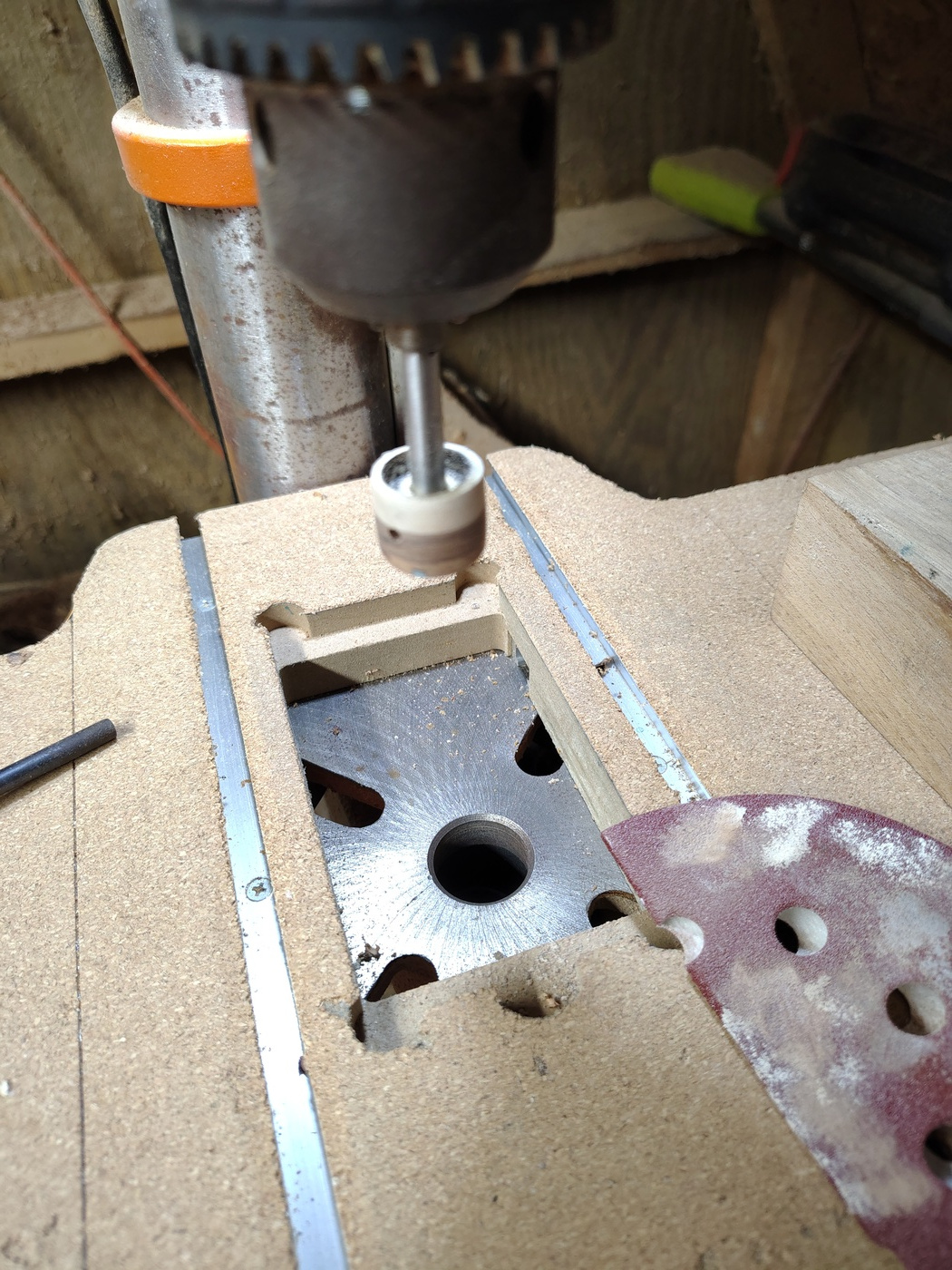 Knob in drill press for
                sanding to shape