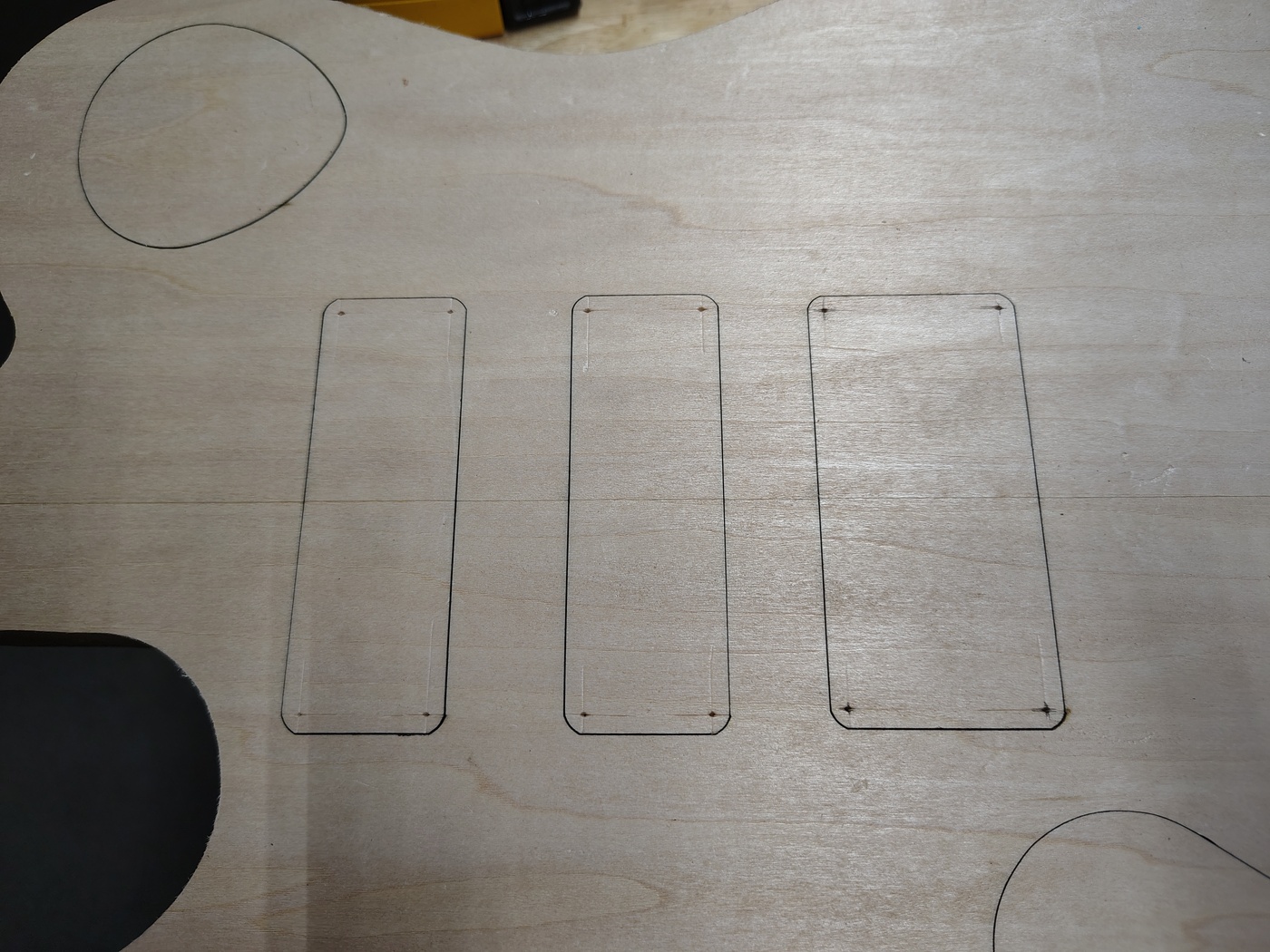 Marking the pickup cover
                  plates for machine screws