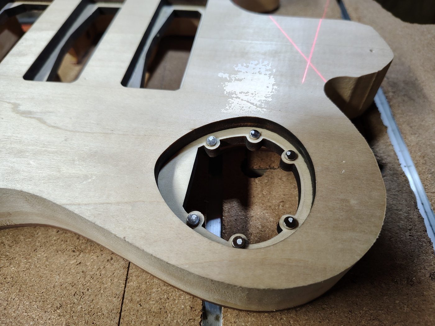 Marking the bottom of the
                cover plate magnets