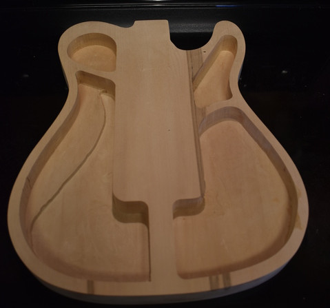 Body blank
                with routed chambers