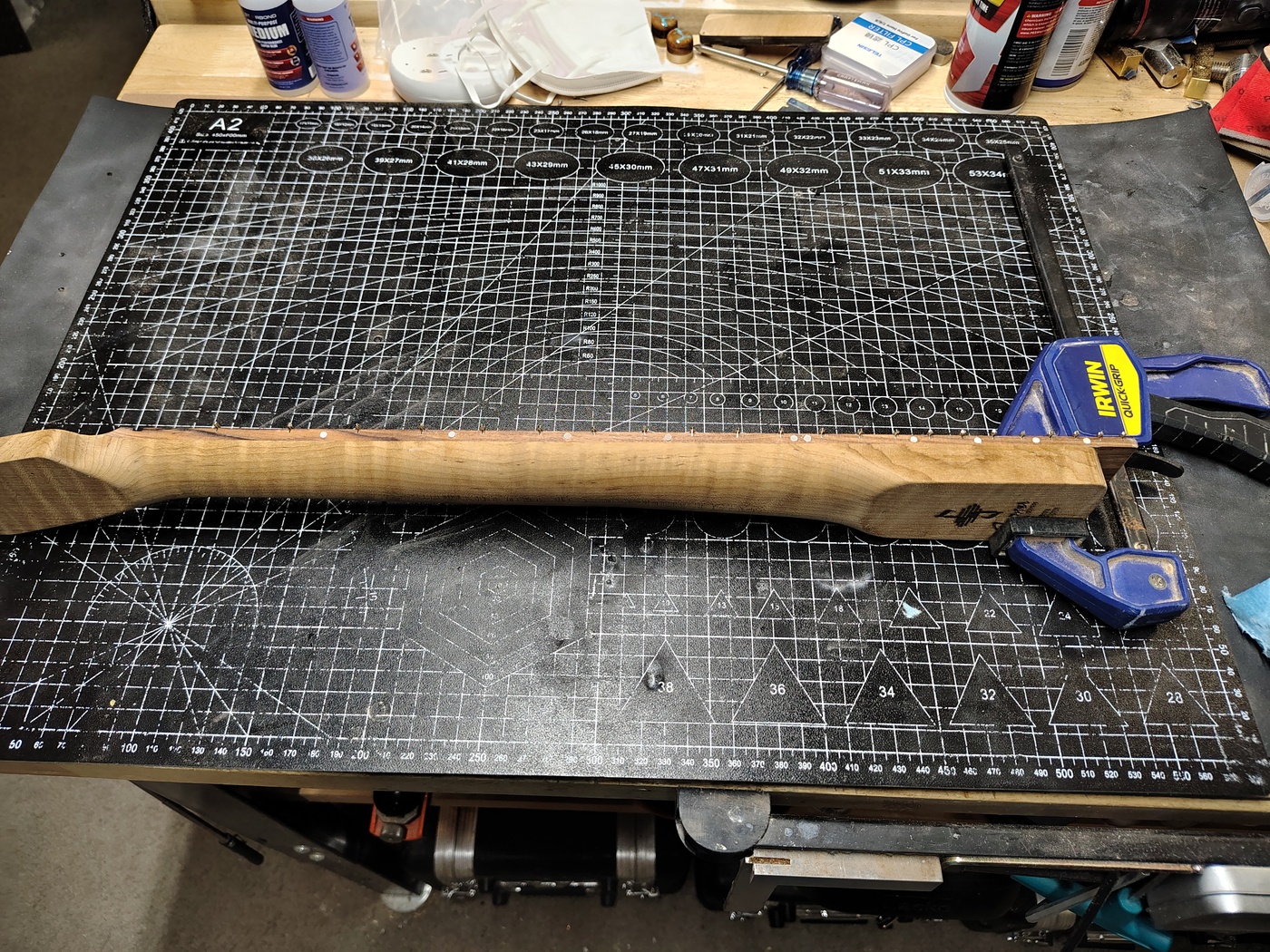 Preparing to fill
                the fret ends