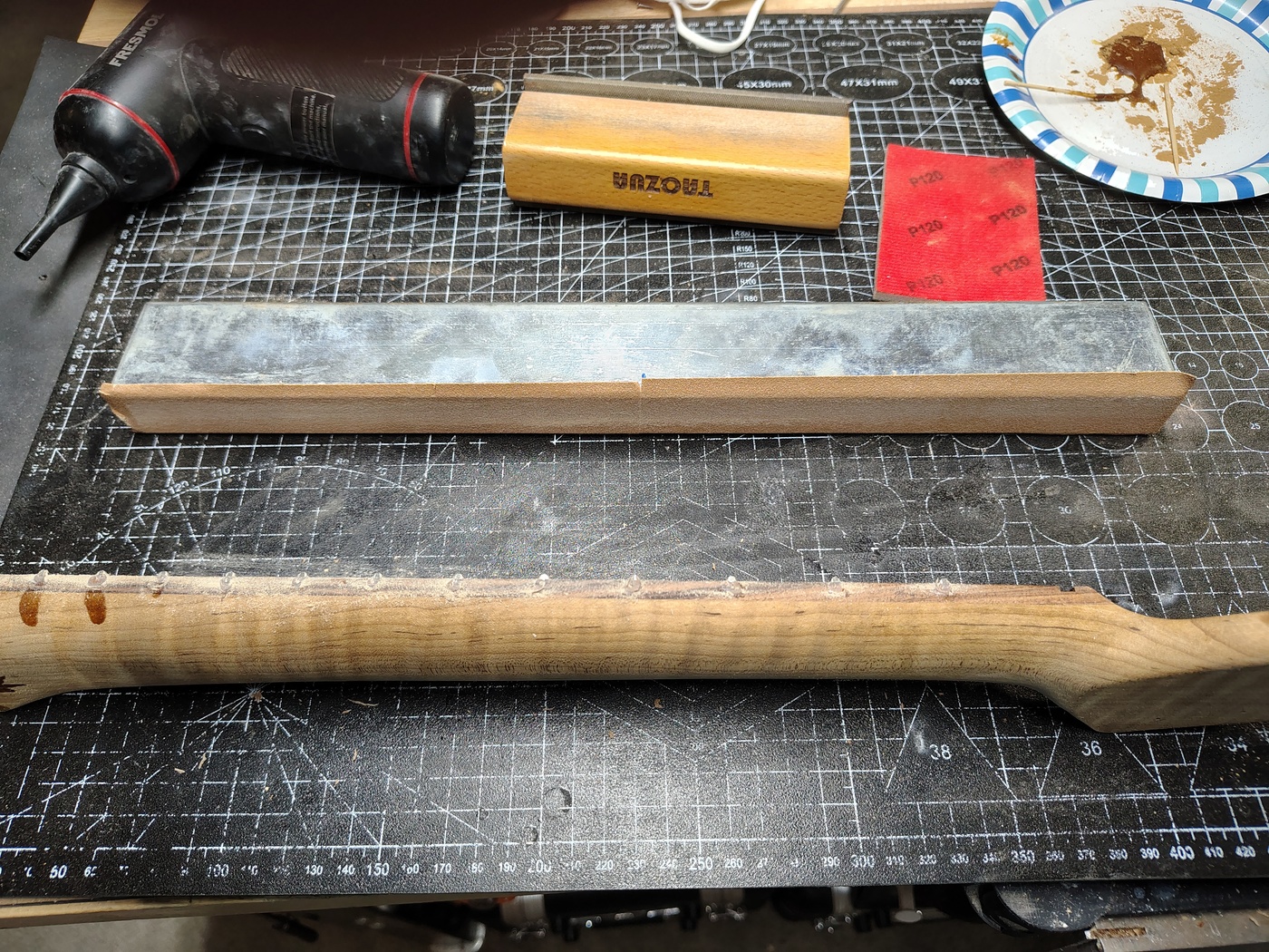 Filing the fret
                ends flat