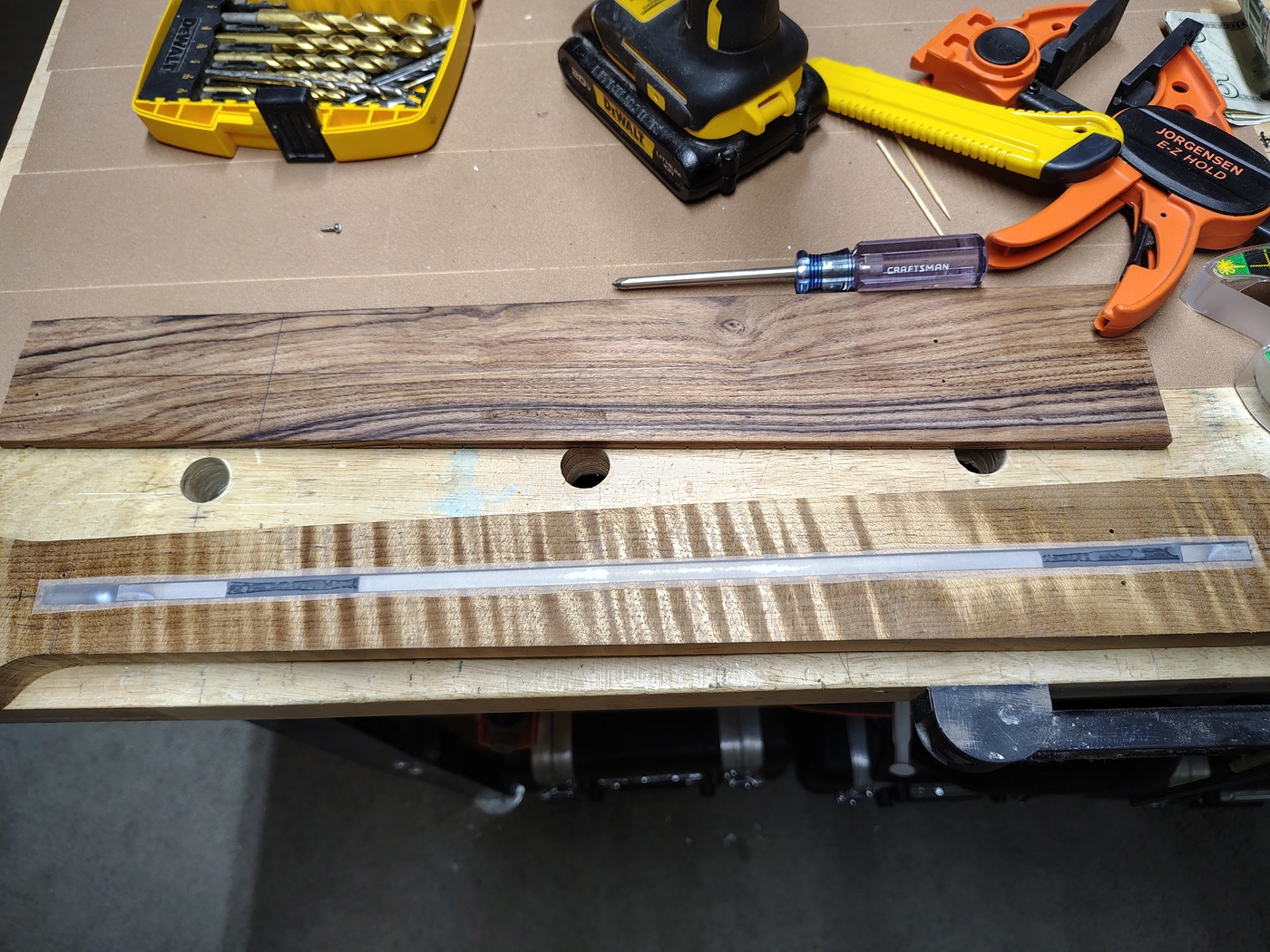 Truss rod covered
                with Scotch tape in channel